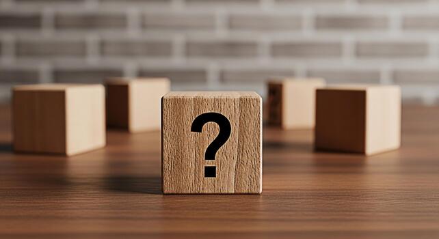 Wooden block displaying a question mark on a wooden table with blurred blocks in the background symbolizing uncertainty problemsolving and the search for answers in a conceptual and thoughtprovoking s photo