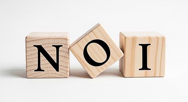 Wooden blocks displaying the word NOI on a white surface representing a clear and concise message symbolizing simplicity and directness in communication ideal for educational or informational purposes photo