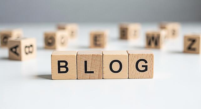 Wooden blocks spelling BLOG on a white surface representing the action of writing and sharing content online creating a sense of creativity information and community in the digital world photo