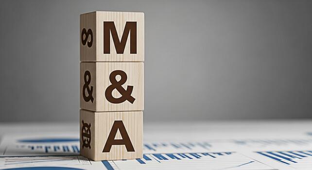 Wooden blocks spelling MA stacked on financial charts representing mergers and acquisitions in a corporate setting conveying a message of strategic growth and business development with a neutral backg photo