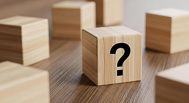 Wooden block displaying a question mark on a wooden surface surrounded by other blocks symbolizing uncertainty and the need for answers in a business or educational setting creating a thoughtful mood photo