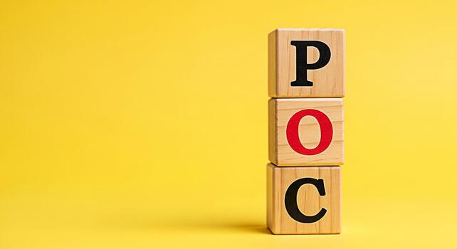 Wooden blocks displaying POC in a bright yellow studio representing Proof of Concept showcasing business strategy and innovation with a focus on validation and feasibility conveying a sense of clarity photo