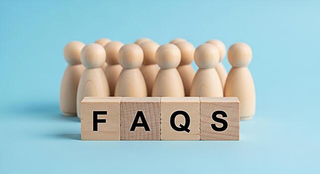 Wooden figures standing behind FAQ blocks on a blue background representing frequently asked questions and customer support creating a helpful and informative atmosphere photo