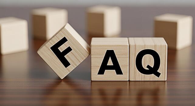 Wooden blocks spelling FAQ on a wooden surface symbolizing frequently asked questions in a business or educational setting creating a clear and informative visual for online help and customer support photo