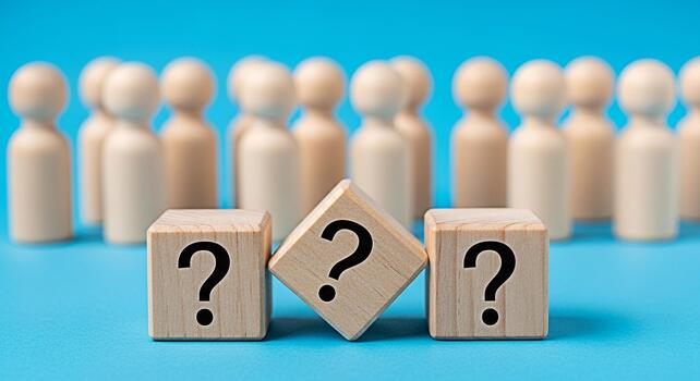 Wooden figures standing behind question mark blocks on a blue background representing uncertainty and the need for answers in business career or personal life creating a sense of mystery and intrigue photo