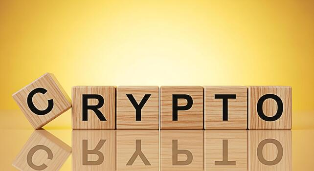 Wooden blocks spelling CRYPTO on a reflective surface against a golden background representing digital currency blockchain technology and the future of finance with a modern and innovative feel photo