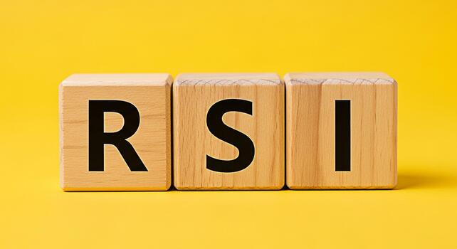 Wooden blocks spelling RSI on a bright yellow background representing relative strength index a momentum indicator used in technical analysis conveying financial market analysis and investment strateg photo
