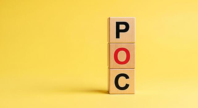 Wooden blocks spelling POC stacked against a vibrant yellow background symbolizing Proof of Concept and showcasing a simple clear message for business and technology presentations emphasizing validati photo