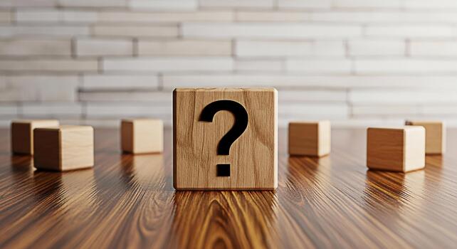 Wooden cube displaying a question mark on a shiny wooden surface surrounded by other cubes evoking curiosity and uncertainty in a modern minimalist setting perfect for business and educational concept photo