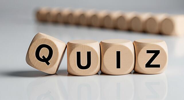 Wooden blocks spelling QUIZ on a white surface representing a test or challenge in an educational setting evoking curiosity and engagement with learning and knowledge assessment photo