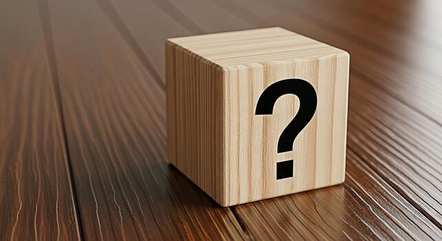 Wooden cube displaying a question mark on a wooden surface symbolizing uncertainty and seeking answers in a business or educational setting fostering curiosity and problemsolving photo