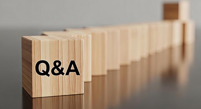 Wooden blocks displaying QA in a row on a reflective surface representing questions and answers knowledge sharing and information exchange in a corporate or educational setting creating a clean and mo photo