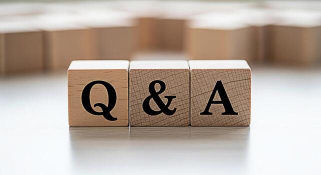 Wooden blocks displaying Q A on a bright white surface representing questions and answers in a simple and direct manner ideal for educational or informational content with a clean and minimalist aesth photo