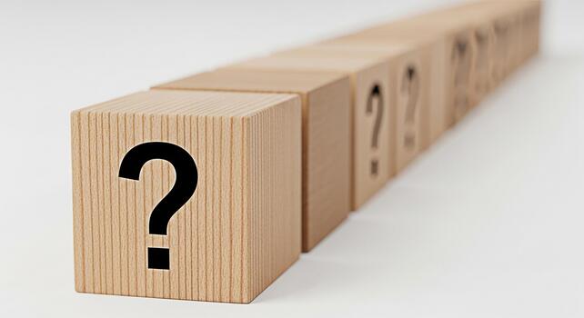 Wooden blocks displaying question marks on a white surface representing uncertainty and the need for answers in business education or personal problemsolving creating a sense of curiosity and inquiry photo