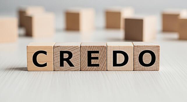 Wooden blocks spelling CREDO on a bright table representing core beliefs and principles conveying a sense of conviction trust and ethical foundation in business and personal life with a minimalist aes photo