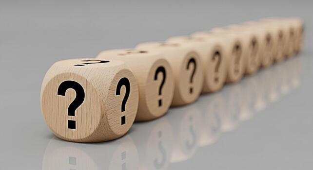 Row of wooden dice displaying question marks on a reflective surface representing uncertainty and the need for answers in a complex and challenging situation creating a mood of contemplation and probl photo