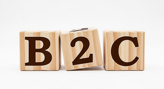 Wooden blocks displaying B2C on a white background representing businesstoconsumer commerce and marketing strategies conveying a message of simplicity and direct customer engagement in a clean setting photo