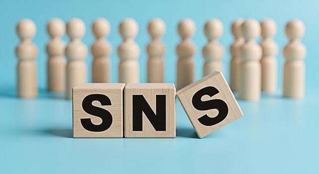 Wooden SNS blocks displaying social networking service concept with blurred wooden figures on a blue background representing community connection and online interaction symbolizing modern communicatio photo