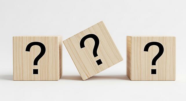 Three wooden blocks displaying question marks on a white surface representing uncertainty and the search for answers in a minimalist and clean setting evoking curiosity and problemsolving photo