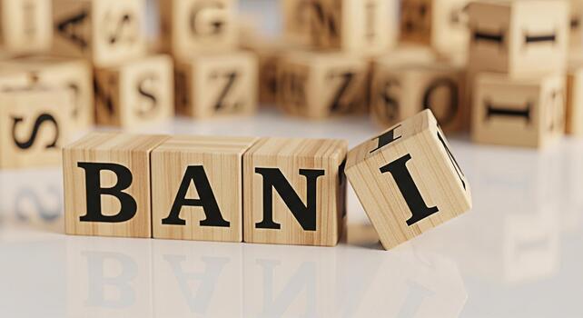 Wooden blocks spelling out BANI on a reflective surface representing the fragility and anxiety of a changing world conveying a sense of uncertainty and volatility in a modern environment photo