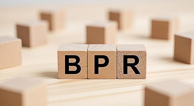 Wooden blocks displaying BPR on a bright wooden surface symbolizing Business Process Reengineering and strategic organizational change for improved efficiency and a modern streamlined workflow photo