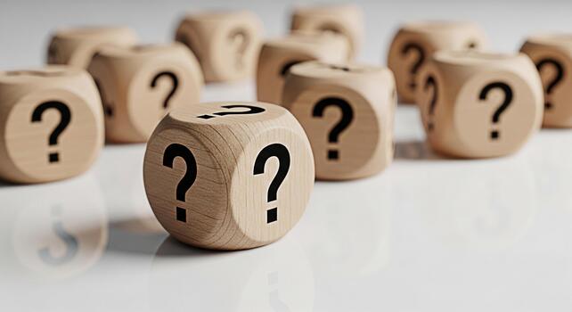 Wooden dice displaying question marks on a white reflective surface symbolizing uncertainty and the search for answers in a clean and minimalist setting creating a sense of curiosity and intellectual photo