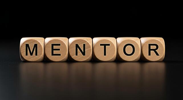 Wooden blocks spelling MENTOR on a dark surface symbolizing guidance and support creating a sense of trust and reliability for professional development and personal growth photo