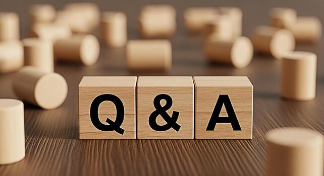 Wooden blocks displaying Q A on a wooden surface representing questions and answers knowledge sharing and interactive learning in a warm inviting environment photo