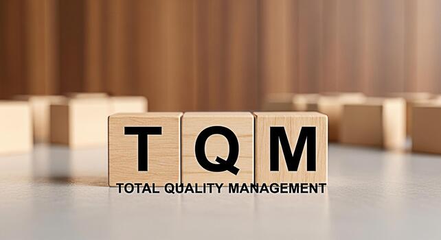 Wooden blocks displaying TQM Total Quality Management in a corporate setting symbolizing efficiency continuous improvement and strategic business practices for optimal performance and customer satisfa photo