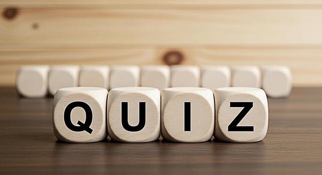 Wooden blocks spelling QUIZ on a wooden table representing a test of knowledge and skills creating a sense of challenge and intellectual stimulation in an educational environment photo