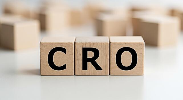 Wooden blocks displaying CRO on a white surface representing conversion rate optimization strategies in a business setting symbolizing growth and success through datadriven marketing and website impro photo