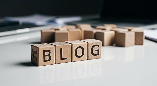Wooden blocks spelling BLOG on a white desk reflecting light symbolizing online content creation and the importance of blogging in a modern digital environment conveying a clean and professional aesth photo