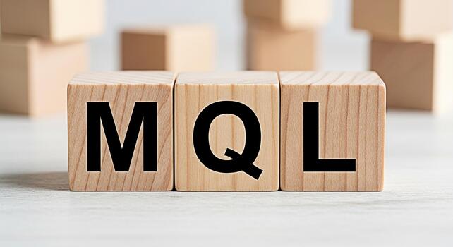 Wooden blocks displaying MQL on a bright surface representing marketing qualified leads in a business setting conveying a message of lead generation and marketing strategy photo