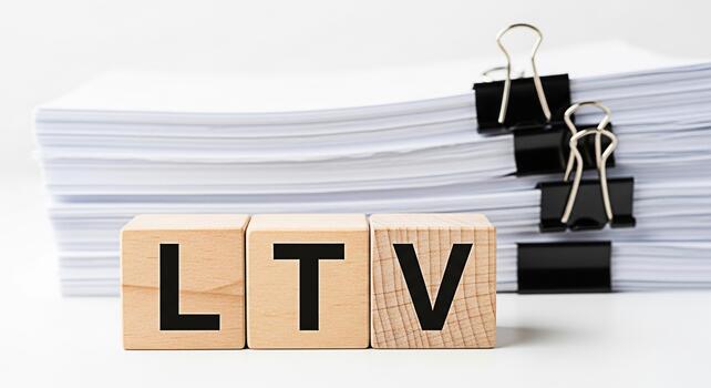 Wooden blocks displaying LTV in a bright office setting representing customer lifetime value and business analytics emphasizing growth and strategic planning for longterm financial success photo