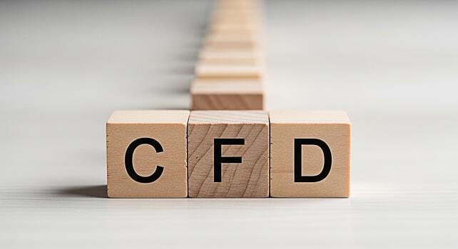 Wooden blocks spelling CFD in a row on a white surface representing contracts for difference in a simple and minimalist setting conveying financial concepts and investment opportunities photo
