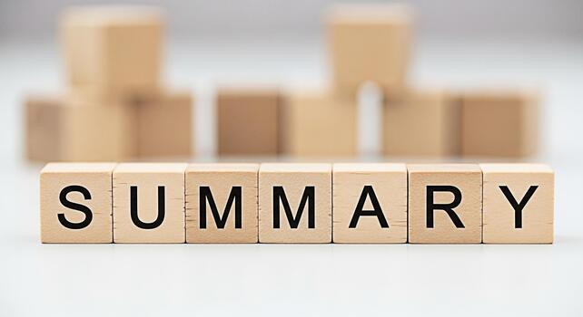 Wooden blocks spelling SUMMARY on a white surface representing a concise overview and key points conveying clarity and efficiency in a minimalist clean environment ideal for business and education photo