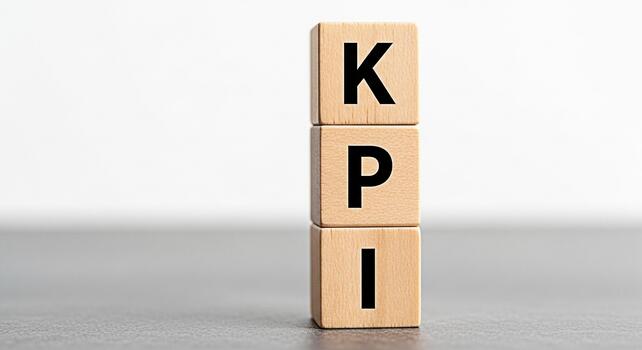 Wooden blocks displaying KPI in a minimalist setting representing key performance indicators and business success conveying a sense of achievement and strategic planning for organizational growth photo