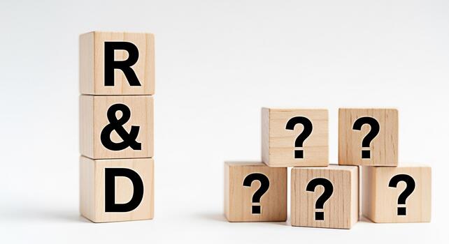 Wooden blocks displaying RD and question marks on a white background representing research and development challenges and uncertainties in the innovation process creating a sense of curiosity and expl photo