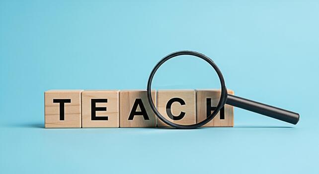 Wooden blocks spelling TEACH are examined with a magnifying glass against a bright blue background representing the concept of learning education and the importance of seeking knowledge and understand photo