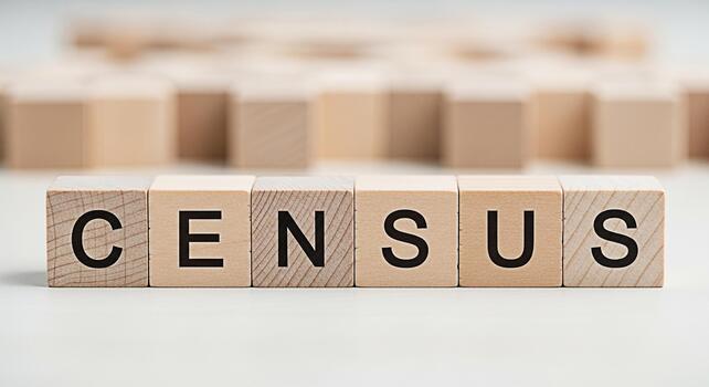 Wooden blocks spelling Census on a white surface representing the importance of population count in a democratic society emphasizing accuracy and civic participation in a bright neutral setting photo