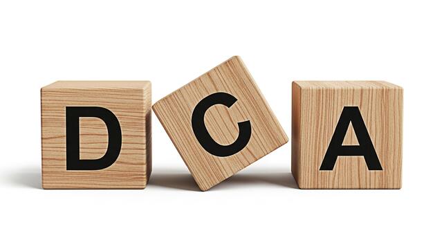 Wooden blocks spelling DCA on a white surface representing dollar cost averaging a financial strategy with a focus on investment and wealth accumulation in a simple and clean setting photo