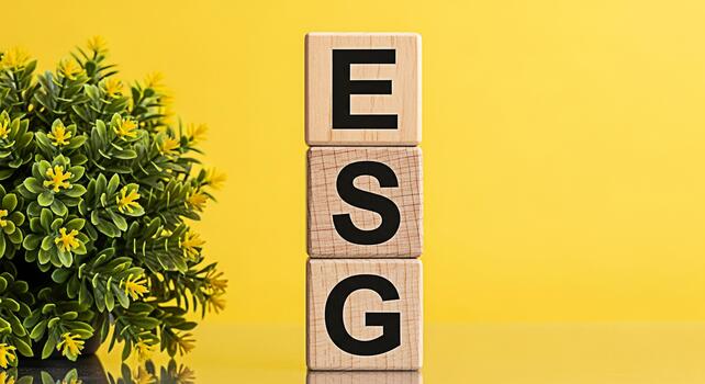 Wooden blocks displaying ESG principles in a bright studio setting symbolizing environmental social and governance factors for sustainable and responsible investing with a focus on ethical business pr photo