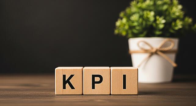 Wooden blocks displaying KPI on a wooden table with a plant in the background representing key performance indicators and business success in a corporate environment conveying a sense of achievement photo