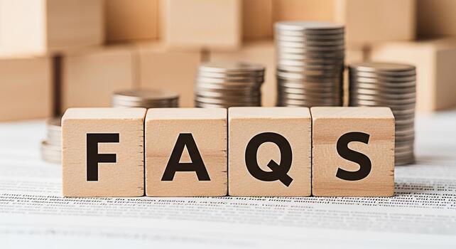 Wooden blocks spelling FAQs on a financial document symbolizing frequently asked questions about finance and investment creating a sense of clarity and understanding in a complex financial landscape photo