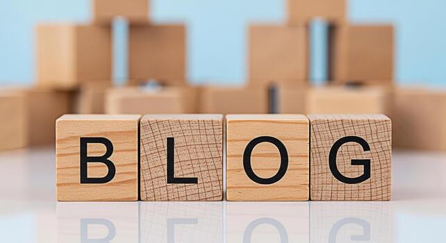 Wooden blocks spelling BLOG on a reflective surface symbolizing online content creation and digital communication in a bright minimalist studio setting conveying a sense of information and connection photo
