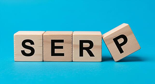 Wooden blocks spelling SERP on a blue background representing Search Engine Results Page optimization conveying a message of strategy success and effective digital marketing in the online world photo