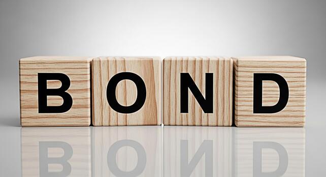 Wooden blocks spelling BOND on a reflective surface symbolizing financial security and strong relationships in a neutral professional setting conveying trust and commitment photo