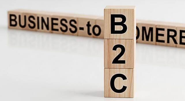 Wooden blocks displaying BusinesstoBusiness and B2C on a white surface symbolizing different business models and strategies conveying a message of strategic planning and market segmentation photo
