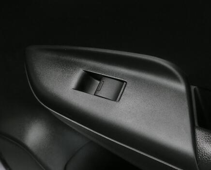 button controlling open and close window in car photo