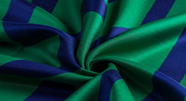 Dynamic textile pattern with vibrant blue and green stripes creating a captivating visual texture and elegant fabric folds a luxurious and colorful photo